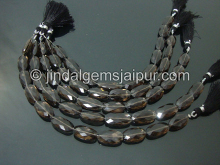 Smokey Faceted Long Oval Shape Beads Smokey Faceted Long Oval Shape Beads