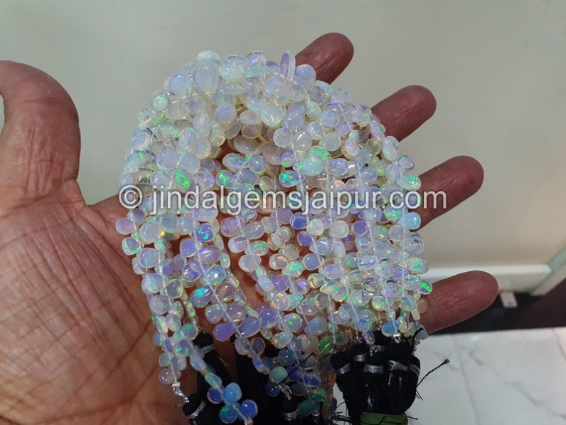 White Ethiopian Opal Smooth Pear Beads