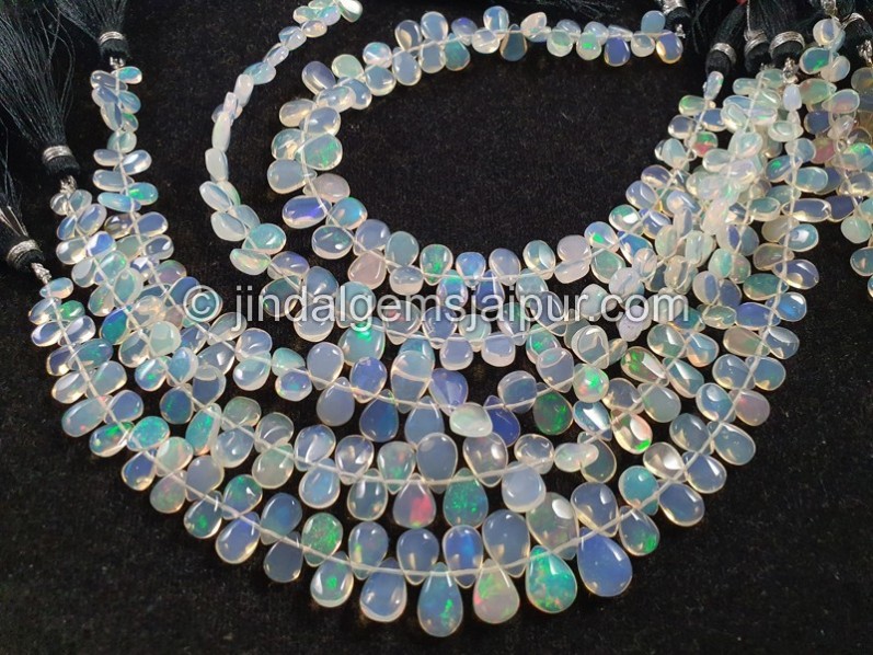 White Ethiopian Opal Smooth Pear Beads